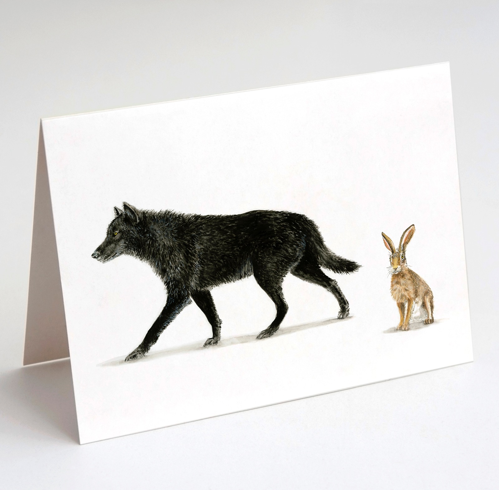 Black wolf and hare note card